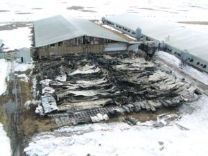 A barn that has been burned down.