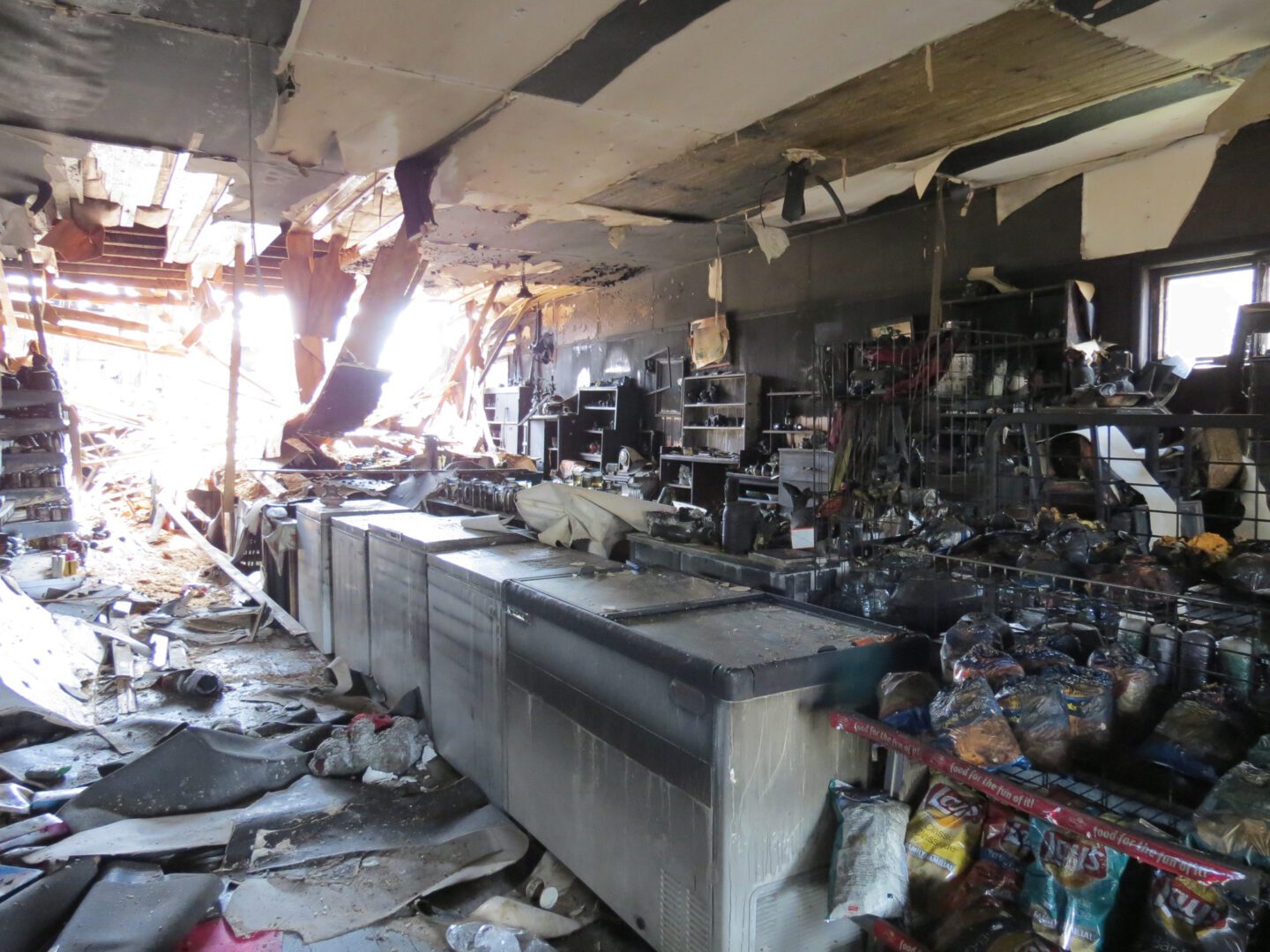 A kitchen that has been destroyed by fire.